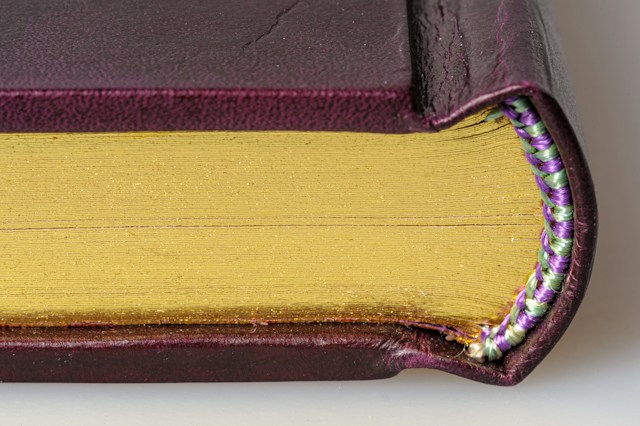Close-up of a bound book with gilded page edges