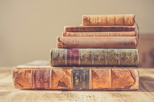 Stack of antique leather-bound books